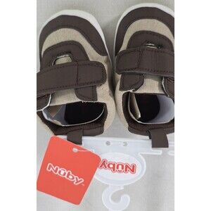 New Nuby Infant Boys Shoes.   Size 6/12 Months.    Color Brown and White.  Size
